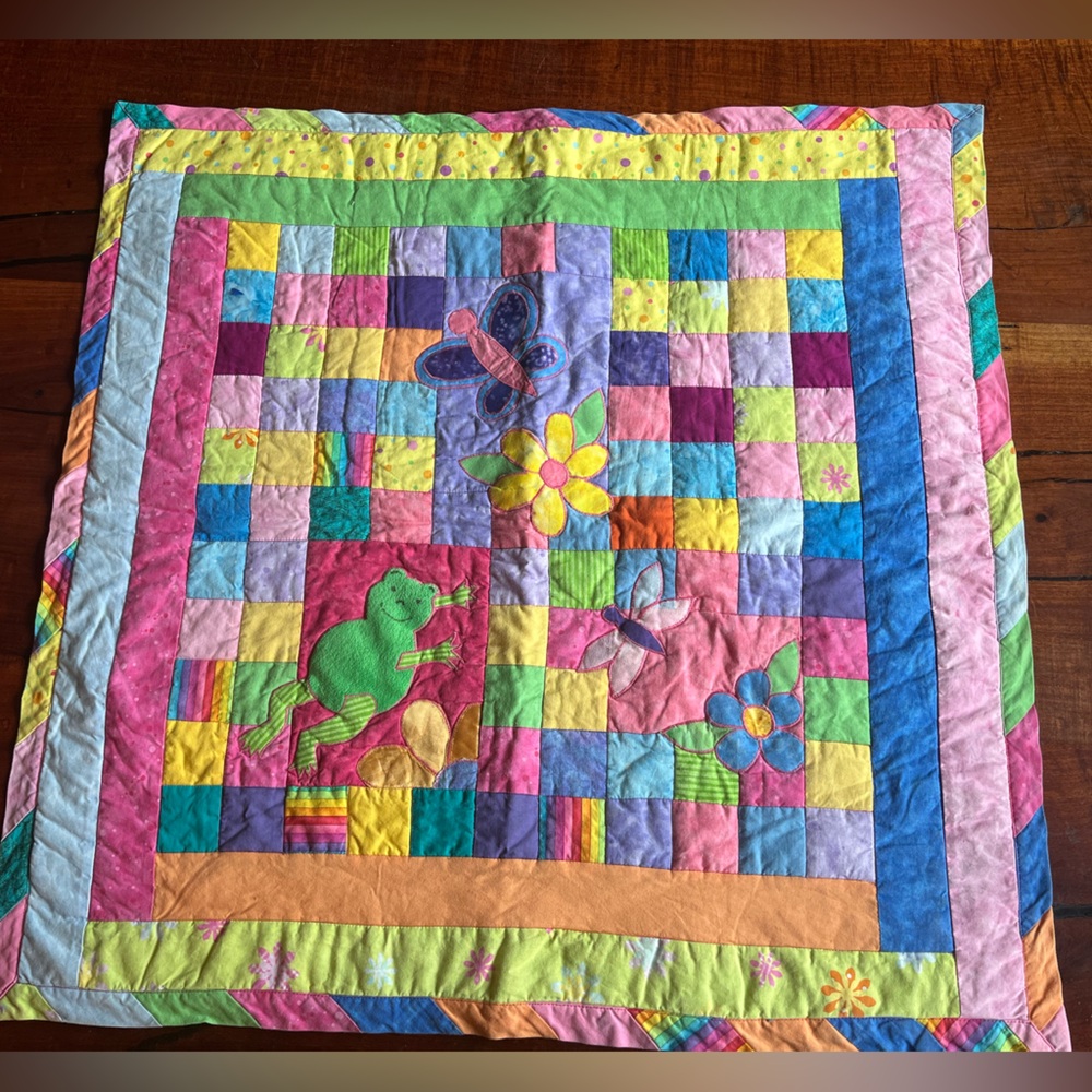 Hand made large doll quilt.